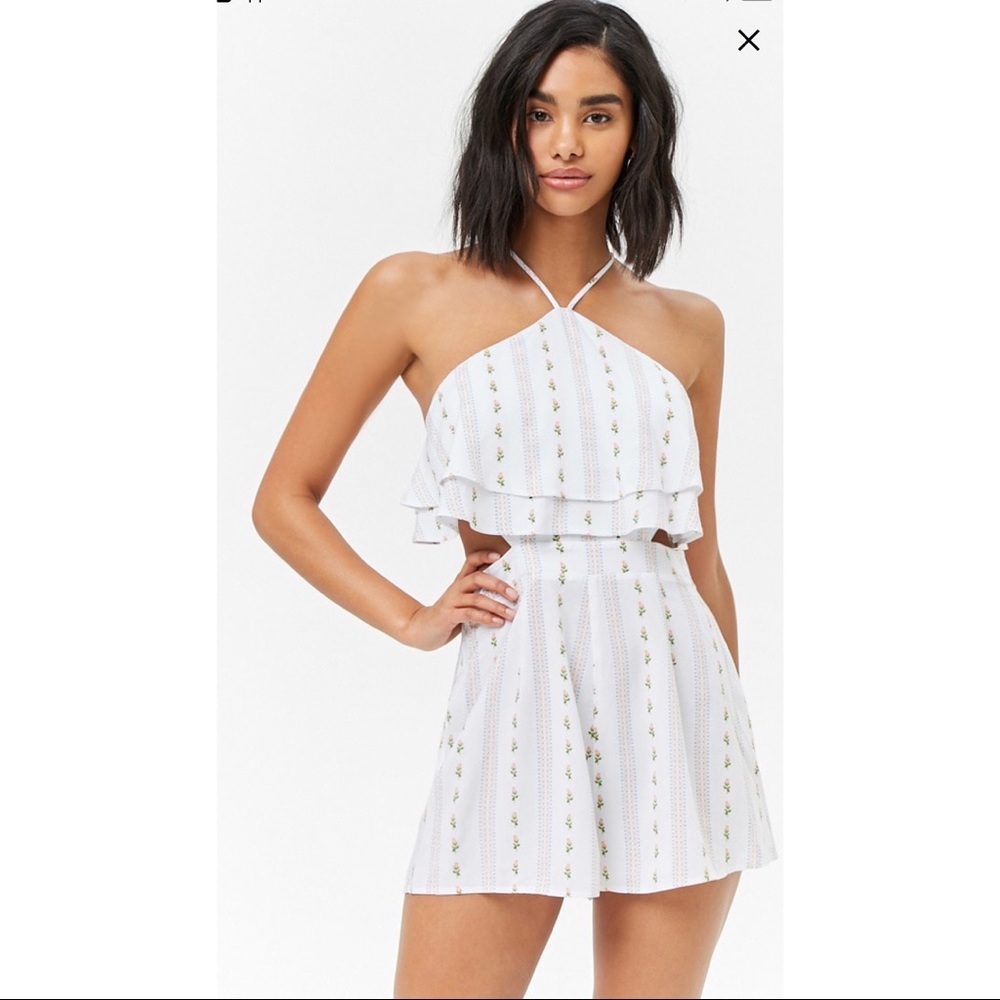 Like new Forever 21 White Floral Cut Out Romper